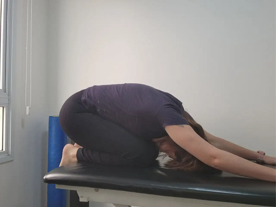 alongamento para tratamento da dor lombar